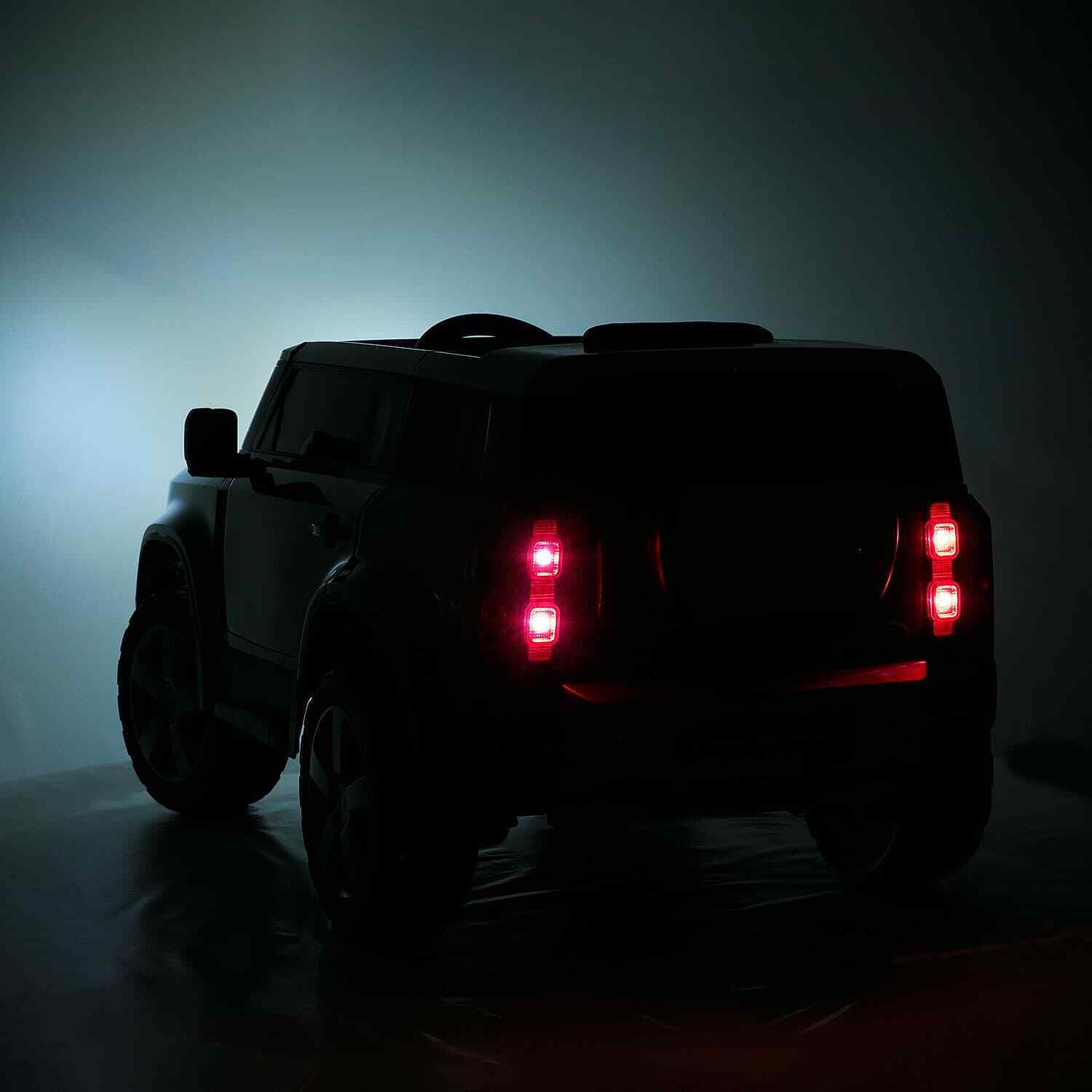 12V Land Rover Defender Kids Ride-On Car with LED Headlights, Leather Seat, MP3 Player, and Remote Control - Image 7